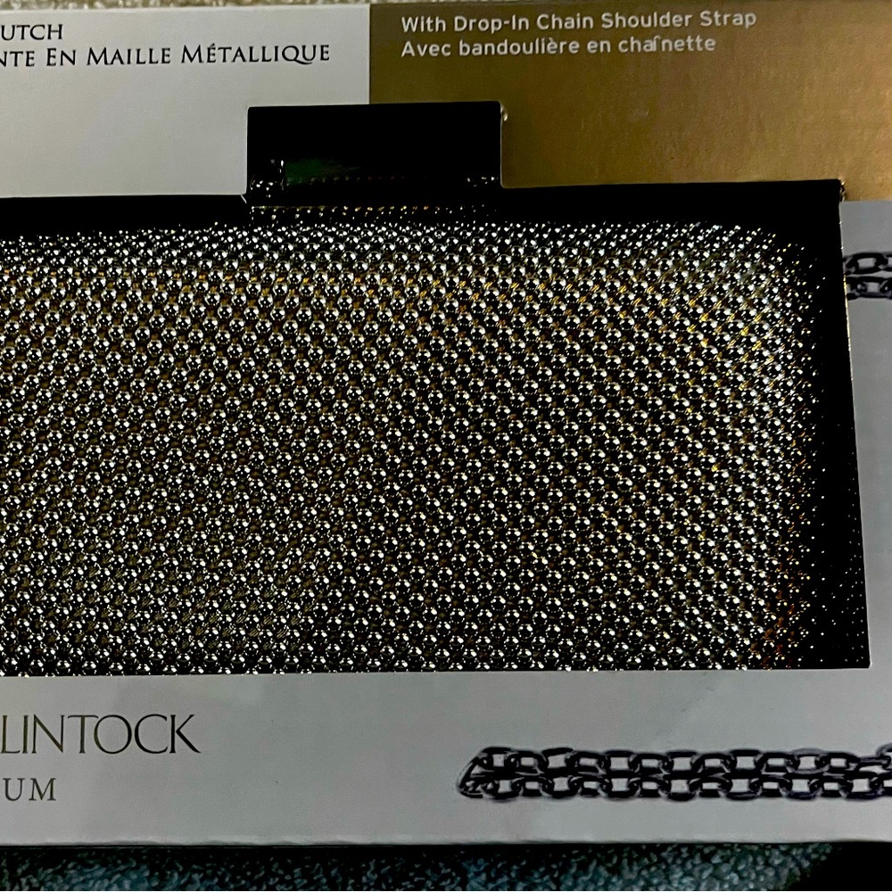 Silver clutch purse with chain strap